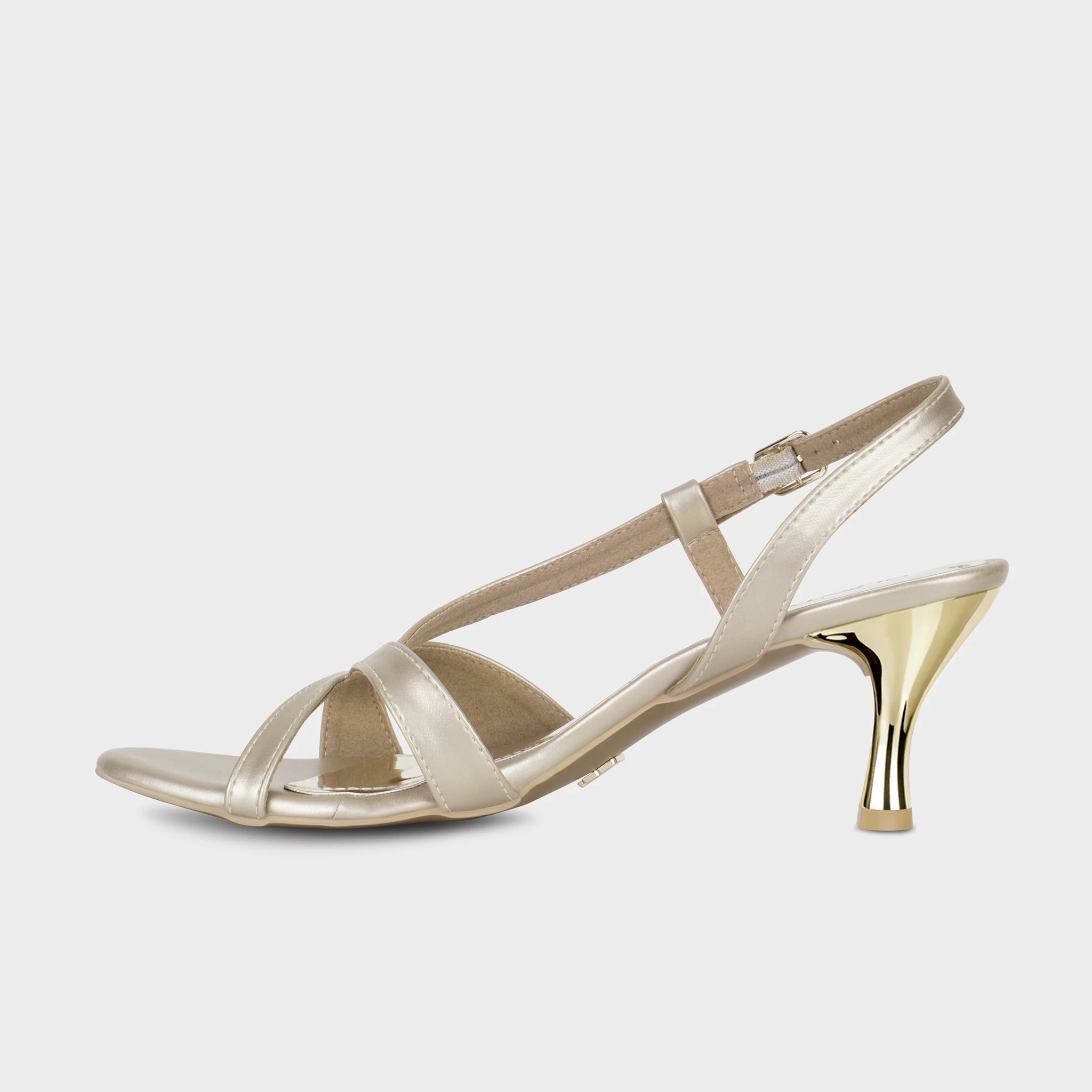 Inner side view of champagne gold Orisea slingback heels showing the asymmetric strap design and polished gold spool heel — Glentè