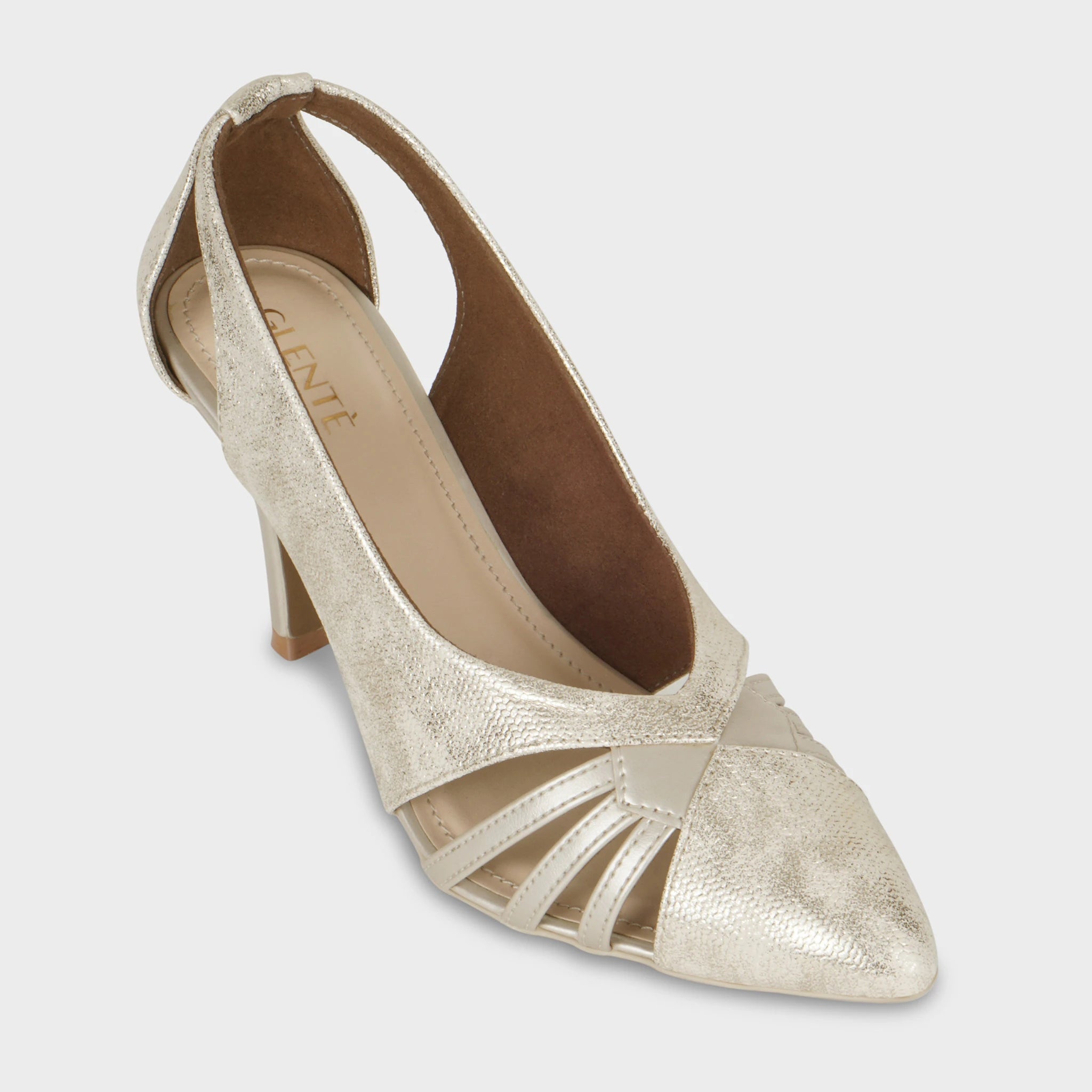 Front angled view of Altavie gold shimmer pumps highlighting the pointed toe, fan-shaped cage strap detailing, suede-lined interior, and gold Glentè branding on the insole