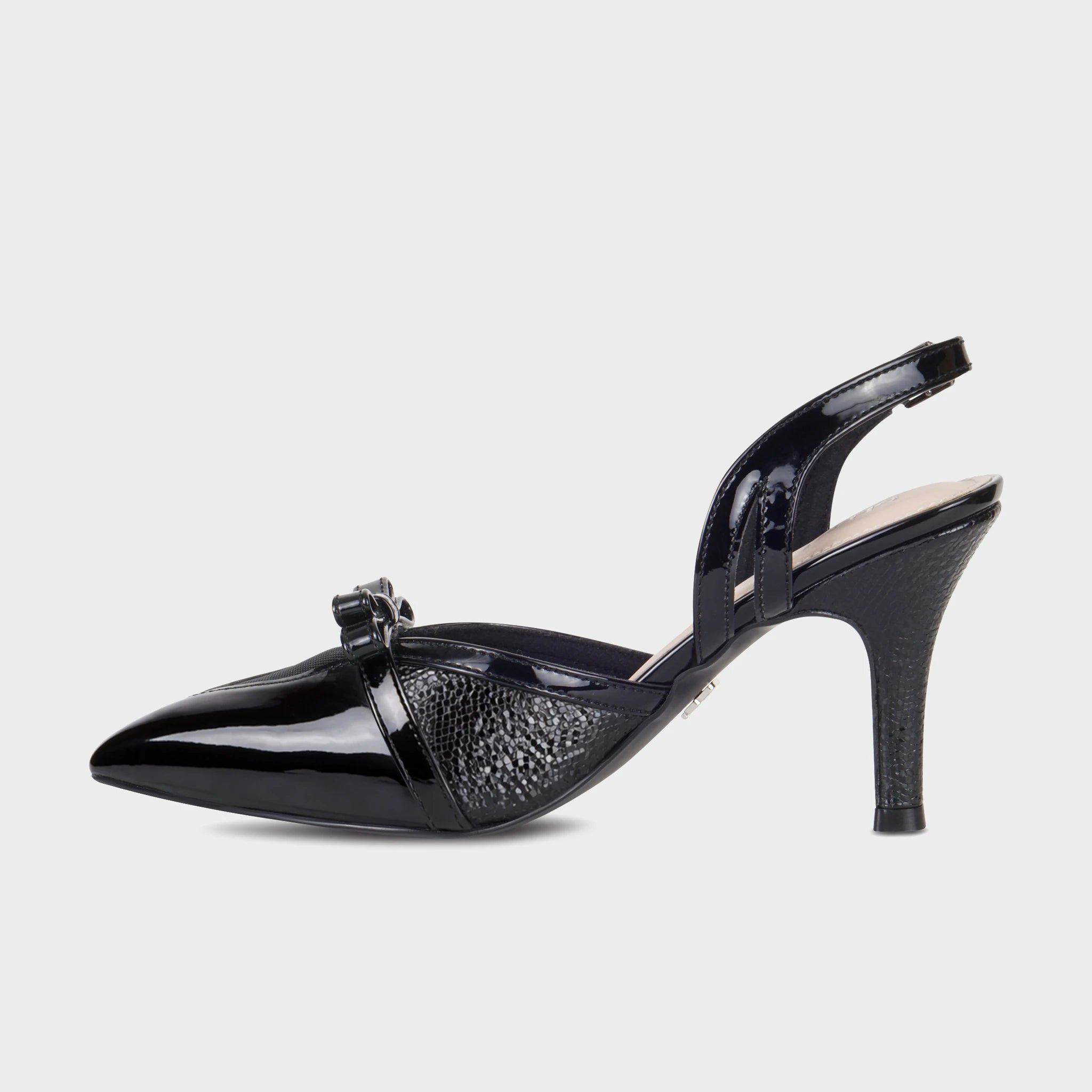 Inner side view of black Celestrine slingback heels showing the high-gloss patent toe cap, textured snake-emboss body, glossy slingback strap, and tapered heel - Glentè