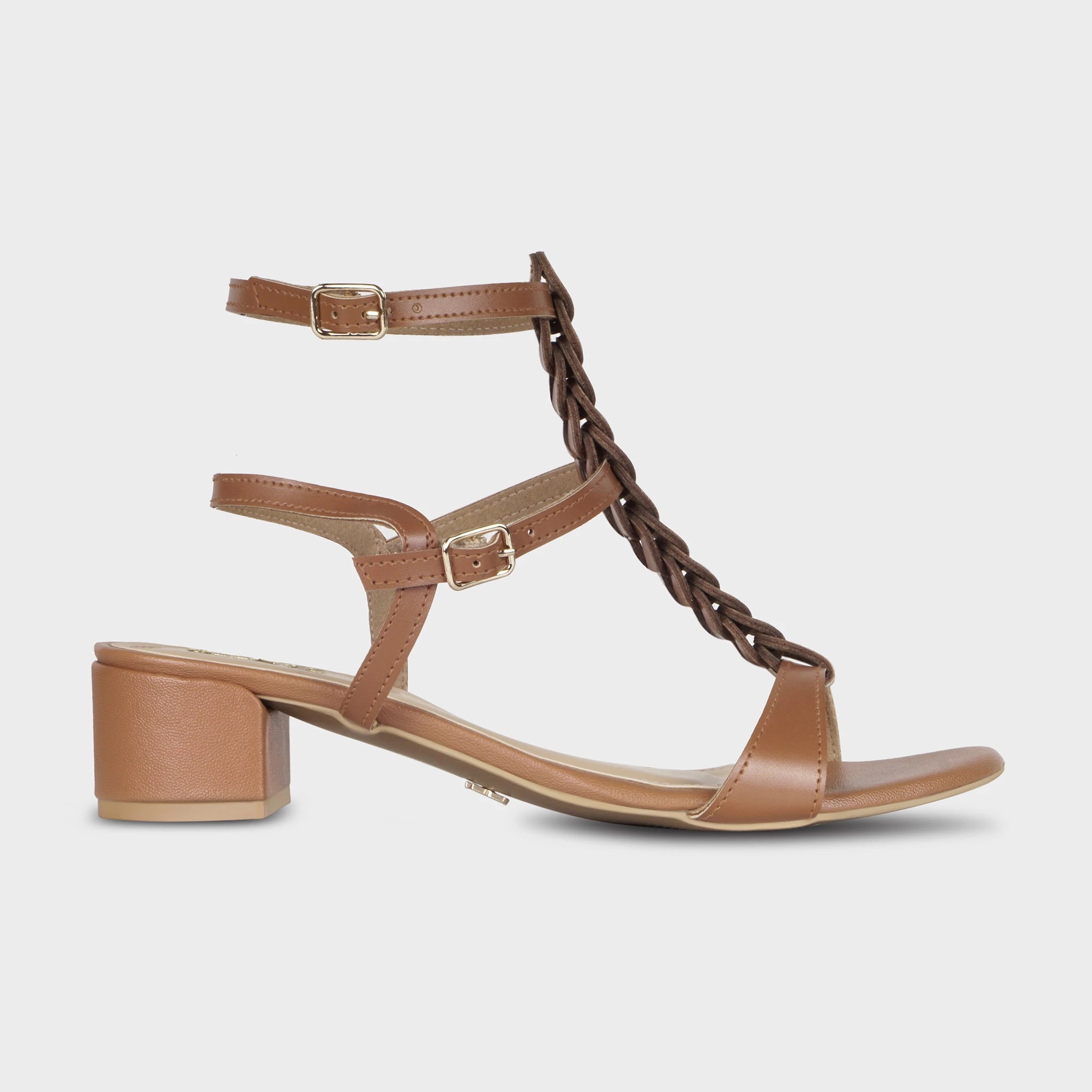 Brown gladiator block heel sandals with a braided T-strap running from toe to ankle, dual gold buckle closures, and a chunky low block heel - Glentè Marvea