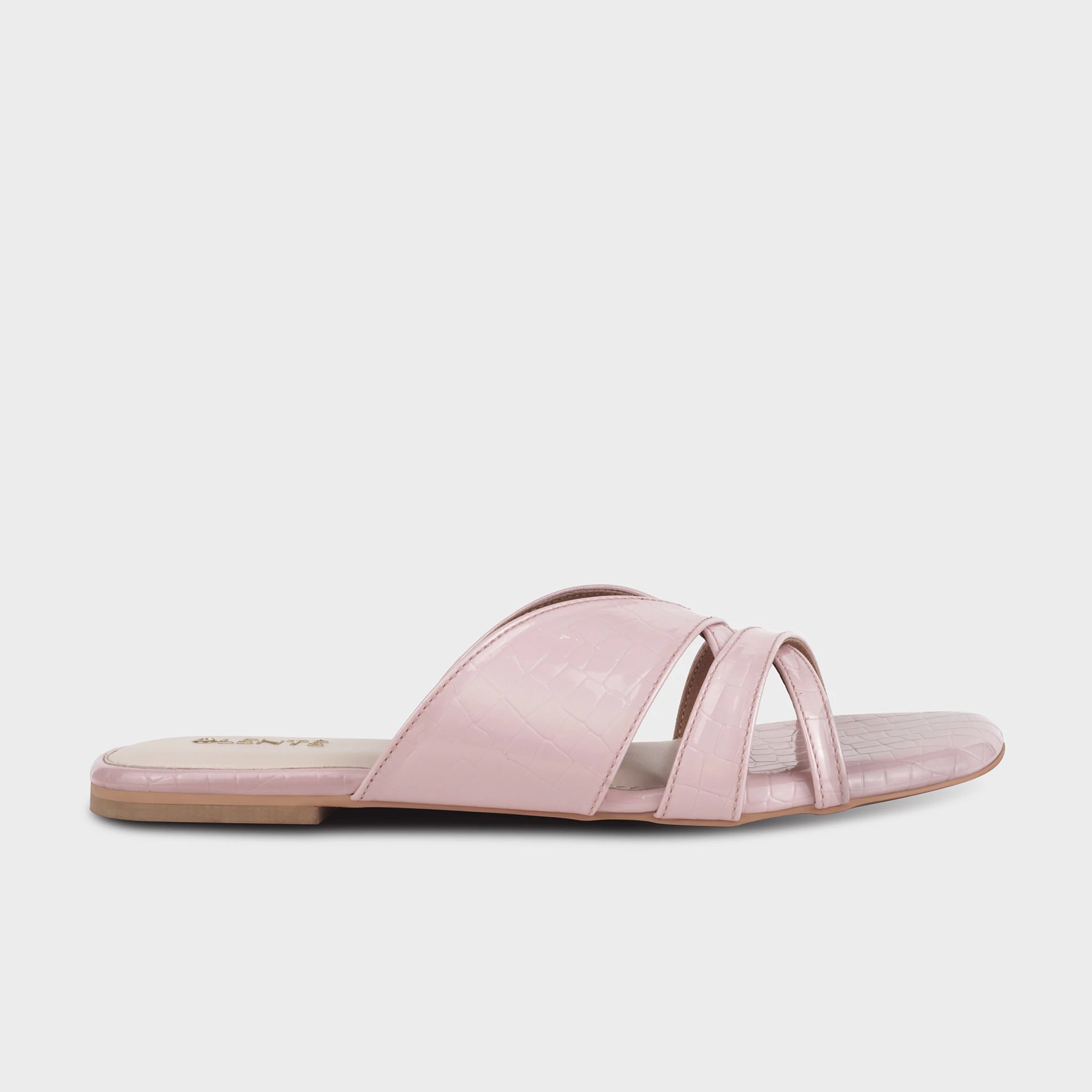 Pink croc-embossed flat slides with interwoven crossover straps, square toe, and gold Glentè branding on a cushioned insole - Glentè Seraya