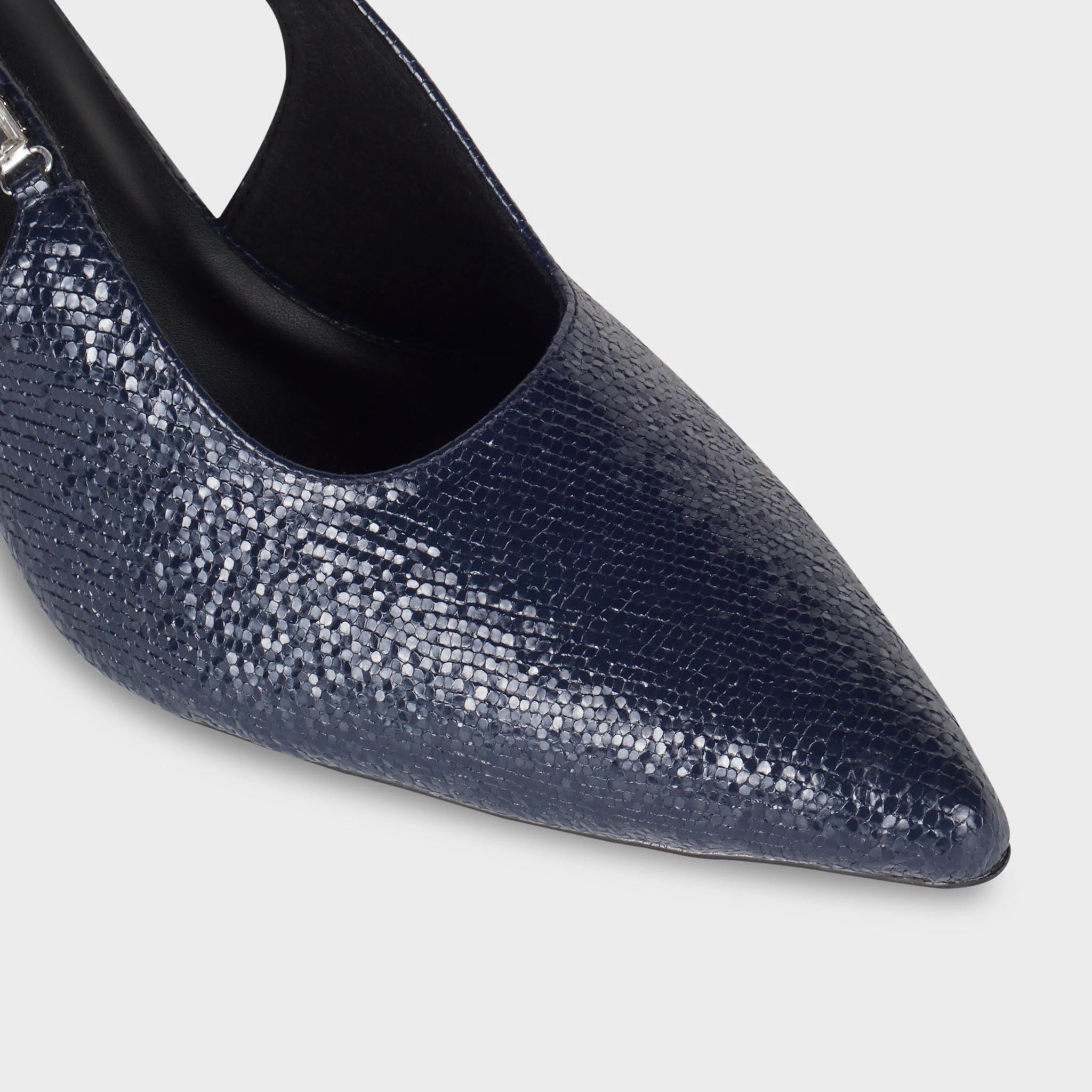 Glentè Vione slingback close-up - navy metallic lizard-emboss pointed toe, high-shine textured finish, deep V vamp cut, black piped sole edge