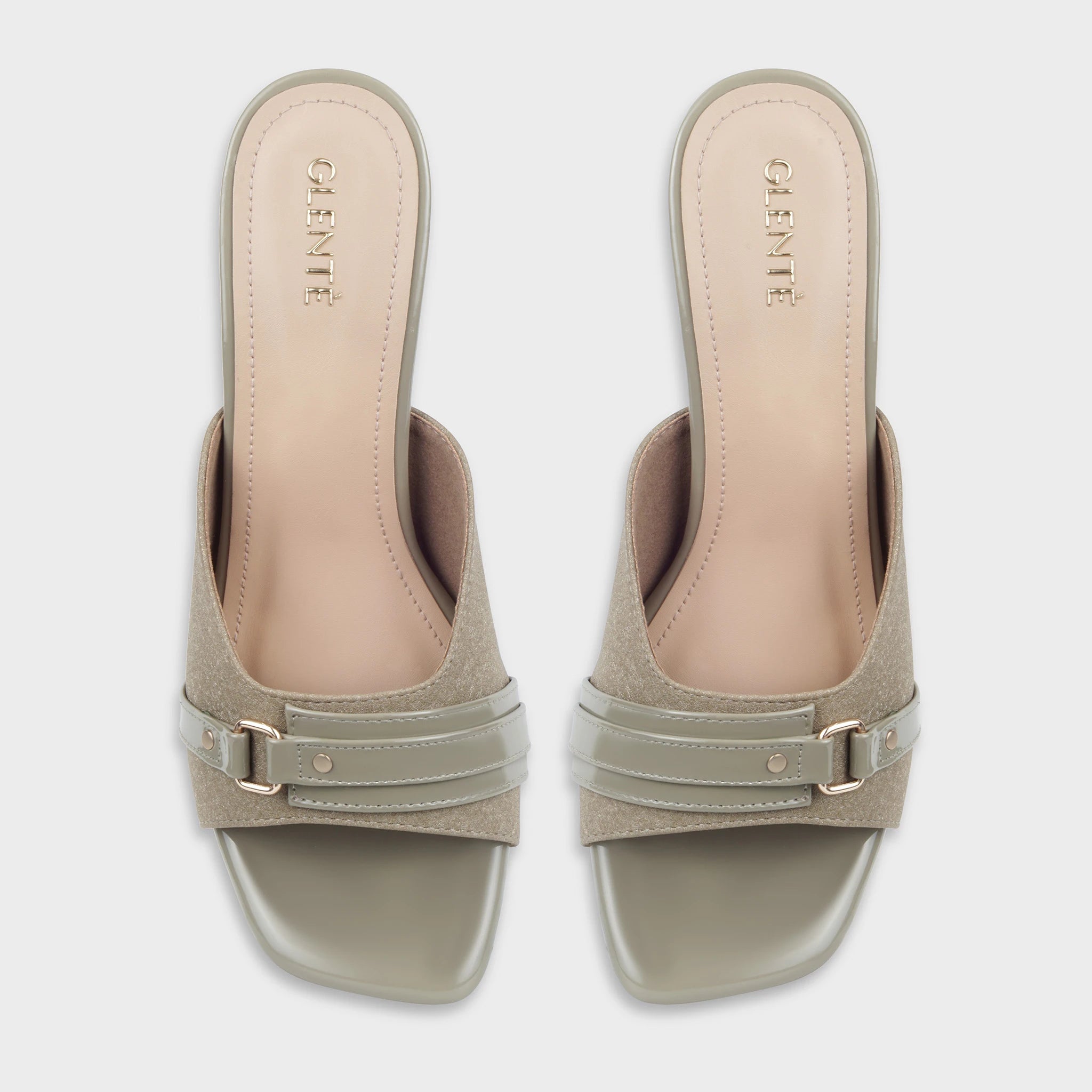 Glentè Viretta sage green mules pair top view - square open toe, suede upper with patent harness strap and gold hardware, nude insole with Glentè gold branding